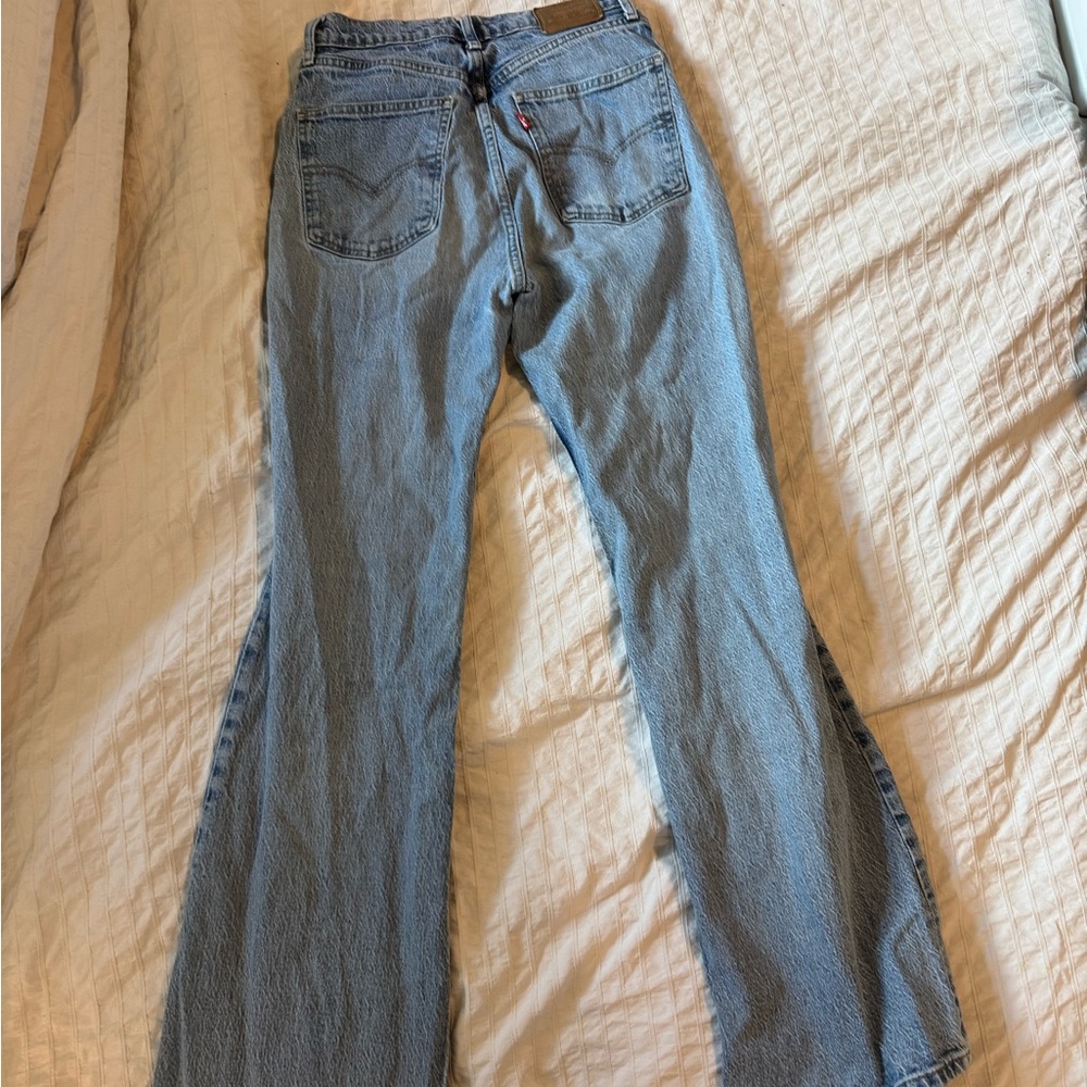 Levi's Women's Light Wash Flare Jeans in Blue